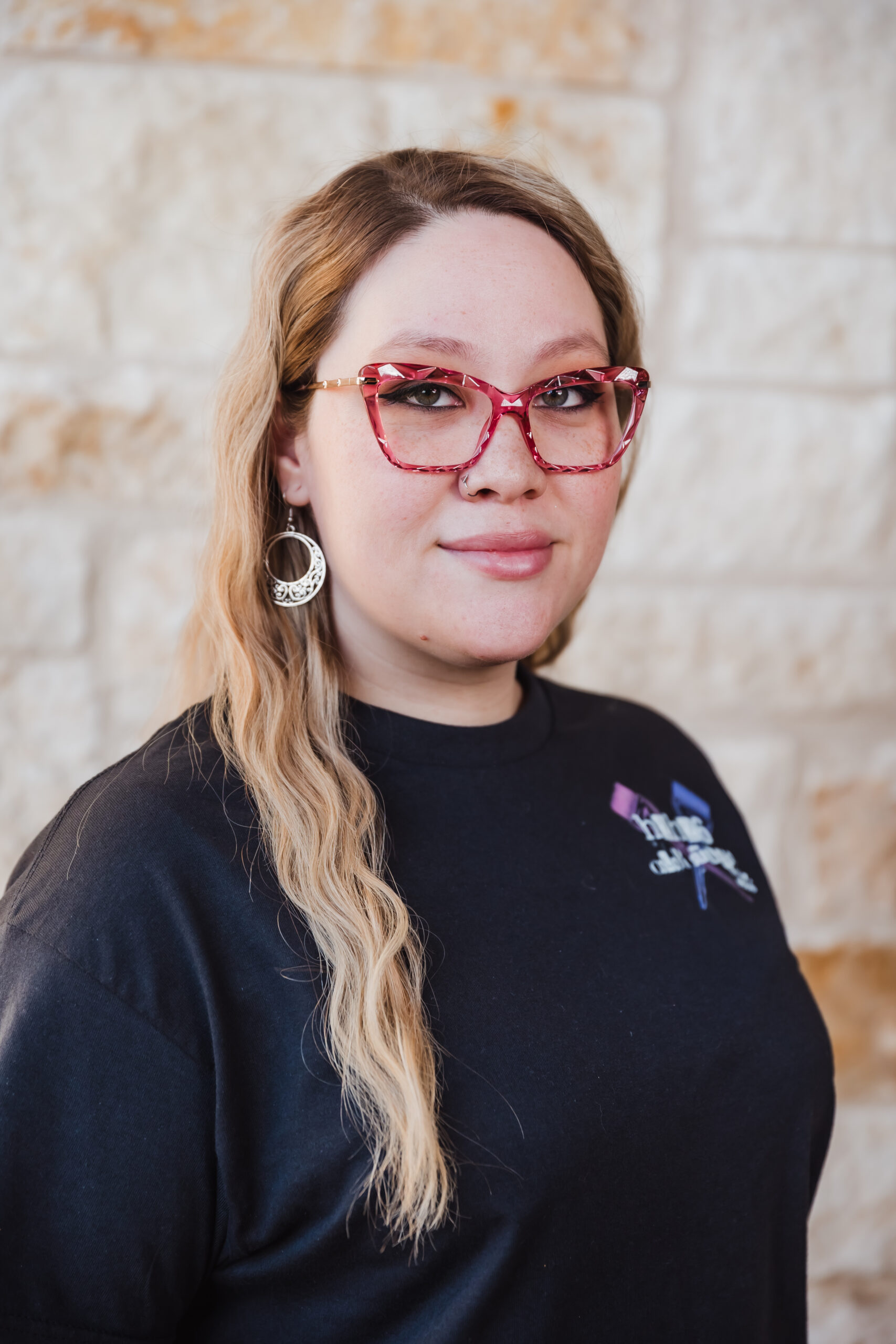 Professional headshot of hairstylist.